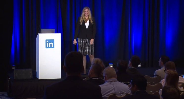 Lindsey presenting on stage at the LinkedIn event